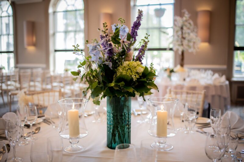 Weddings flowers on table The Queens Hotel