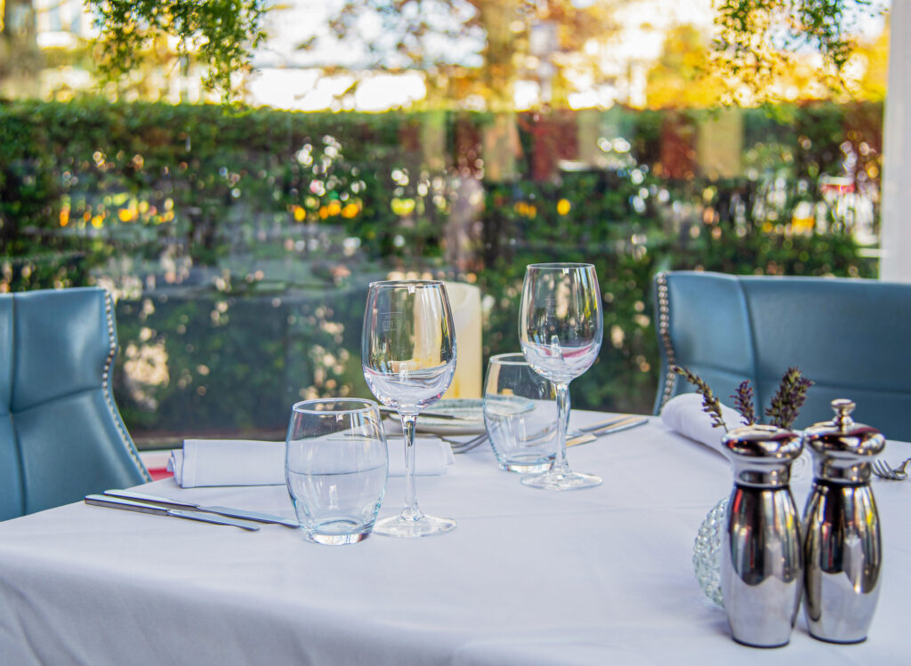 Wine glasses by window Victoria's restaurant