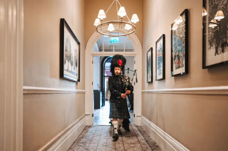 The Queens Hotel Cheltenham Scottish piper