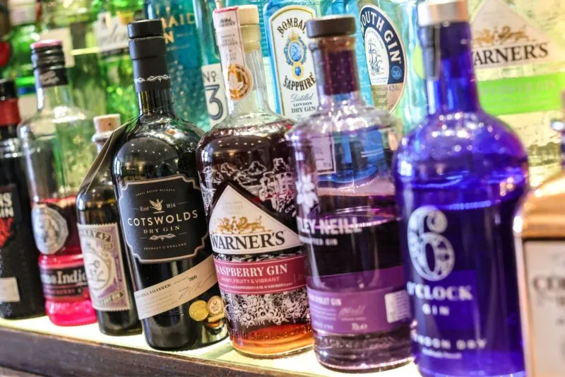 The Queens Hotel Cheltenham gin bottles close up